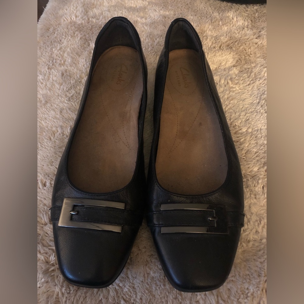 Clarks black leather flats